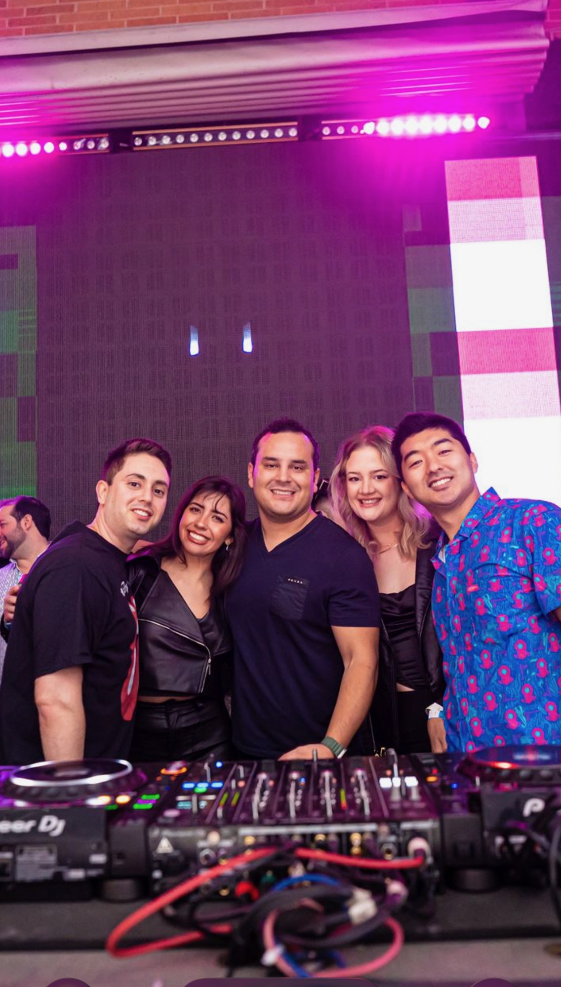 With friends at the booth